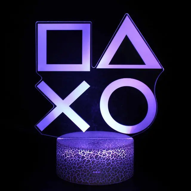 a playstation logo is lit up in the dark