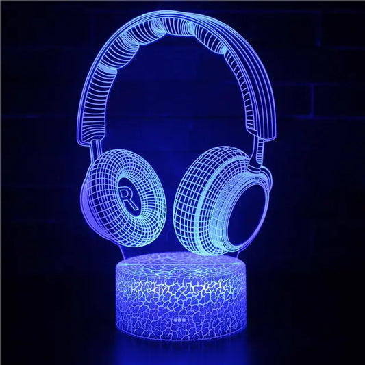 a blue light up headphones sitting on top of a table